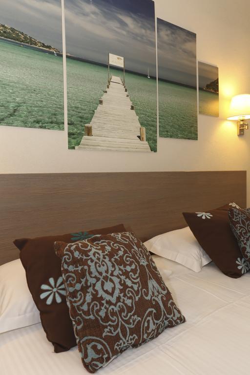 Hotel Duc De Padoue Корте Екстериор снимка
